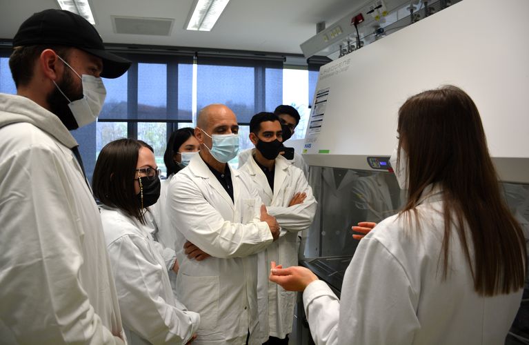The students watching the demonstration