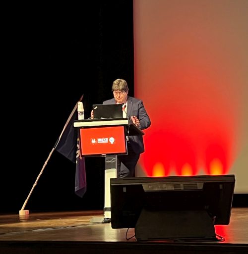 Prof. Boccaccini standing in the podium