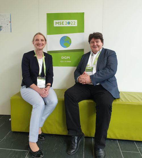 Prof. Boccaccini with team members next to the MSE conference logo