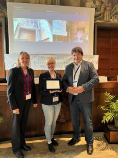 Sonja, Prof. Boccaccini and conference organizer posing with the award.