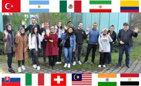 Prof. Boccaccini standing outside the institute with the group of international visitors.