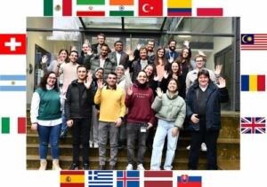 Prof. Boccaccini standing with the international visitors outside the institute main entrance.