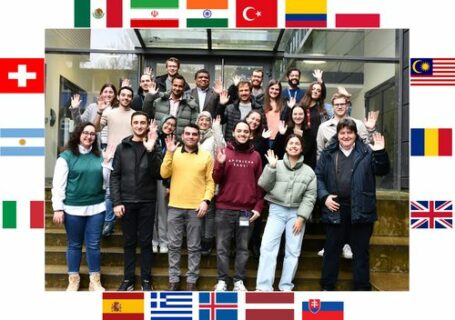 Prof. Boccaccini standing with the international visitors outside the institute main entrance.