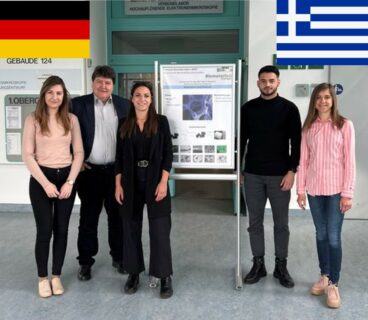 Prof. Boccaccini standing with Faina, Zoya and the visitors from Greece, in the hall of the institute