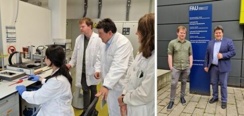 Left: Prof. Boccaccini and Prof. Daly in the lab, watching a 3D printing demonstration. Right: The two standing outside next to the institutes sign