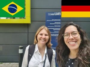 Prof. Sayer and Clara standing outside the institute.