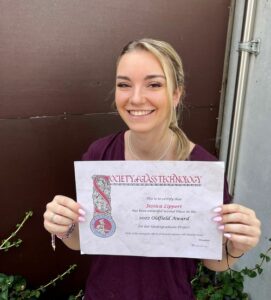 Miss Lippert with her award diploma.