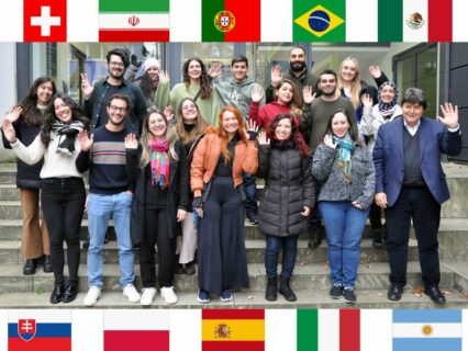 The international visitors standing with Prof. Boccaccini in the entrance of the institute.