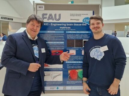 Prof. Boccaccini and Mr. Lorke standing in front of their poster.