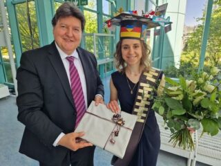 Prof. Boccaccini giving the present to Faina