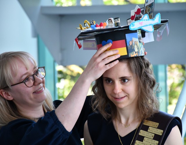 Faina receiving the hat