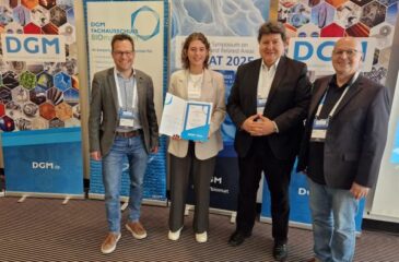 Ms Kissel receiving the award