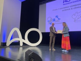 Ms Daniela receiving the award