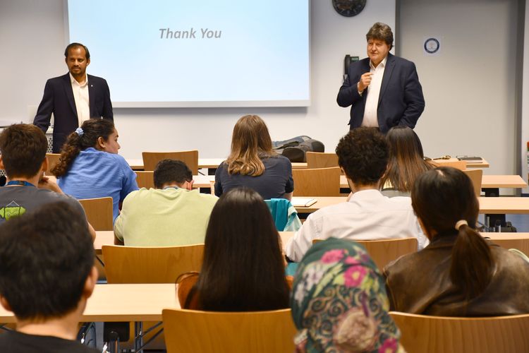 Prof. Dhakshinamoorthy presenting